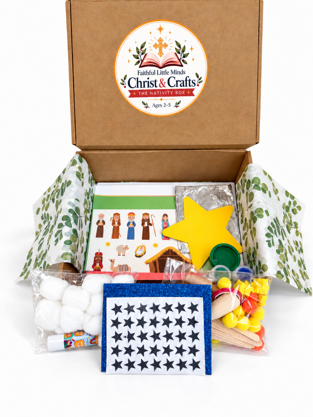 Everything inside the Nativity Activity Box laid out in front of the open box